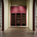 Swisscave Luxury WLB-460DFLD-MIX vrijstaande wijnkoelkast, sfeerfoto in een wijnwinkel